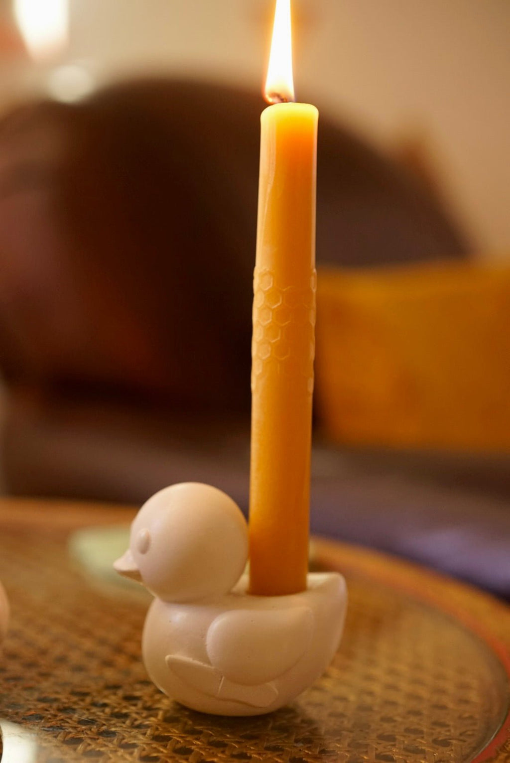 Killer Ducky. ceramic candle holder of rubber duck yeilding knife by artist  Case Peck